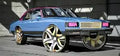 Blue Monte Carlo on Gold Daytons – Coach's Exotic Customs