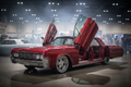 Old school 4 door Lincoln with Lambo doors and suicide butterfly doors on 32 inch Forgiatos